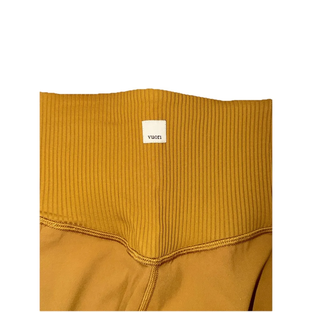 VUORI RIB STUDIO LEGGING 25”DARK GOLDEN COLOR SIZE XS NWT
